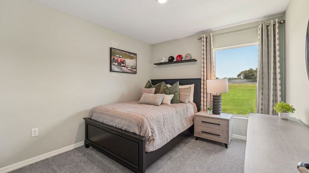 Furnished interior in a model home at Fletcher Trace in Alachua (Image 14).