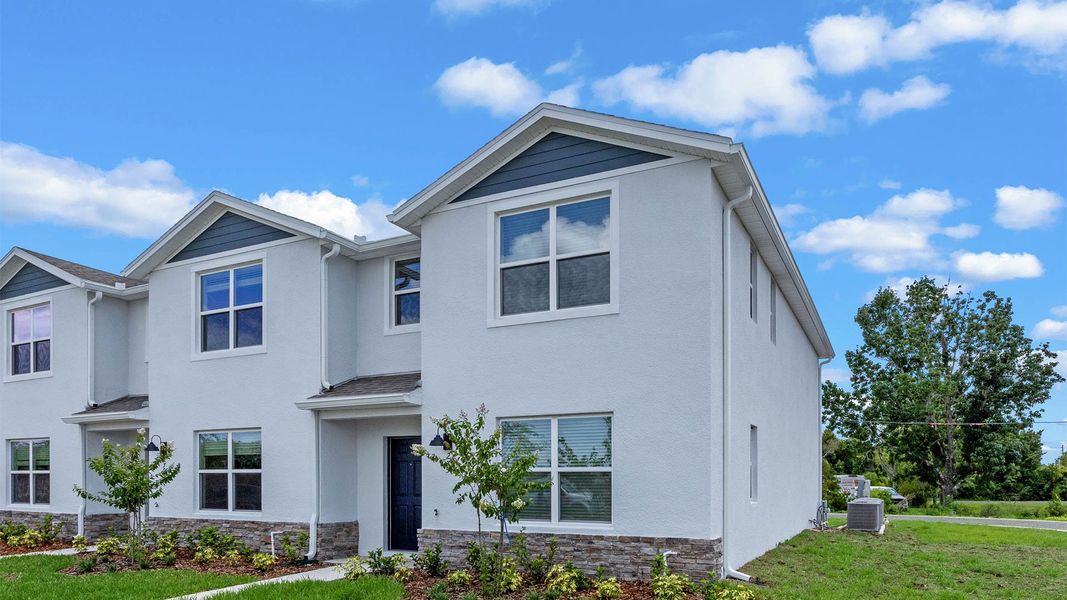 Front exterior of a home in the Evergreen Park community, located in Kissimmee, FL (Image 9).