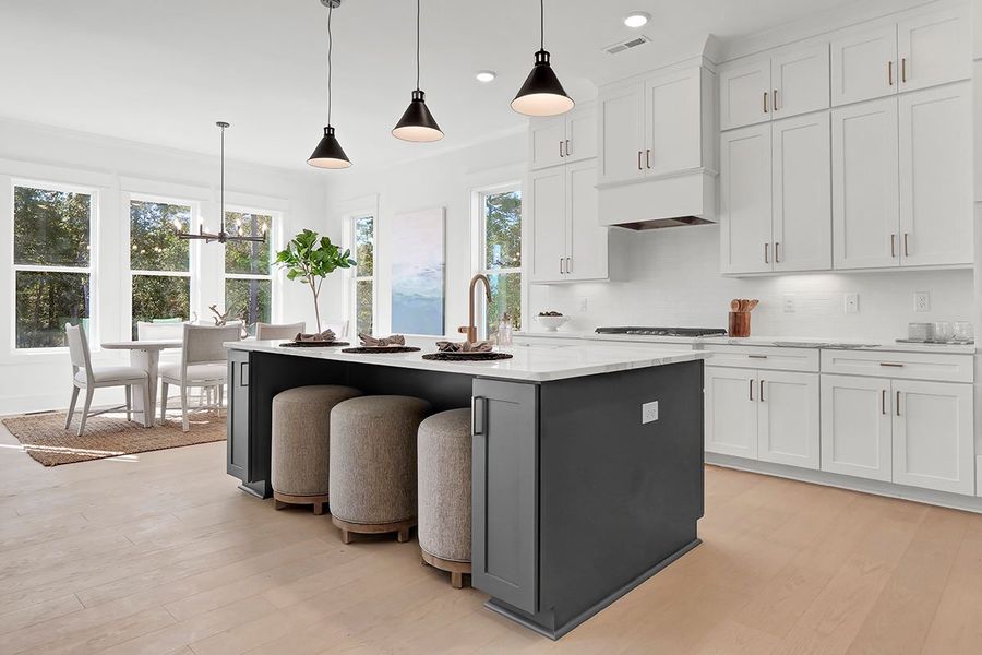 Furnished interior in a model home at Midtown & Main in Wilmington (Image 8).