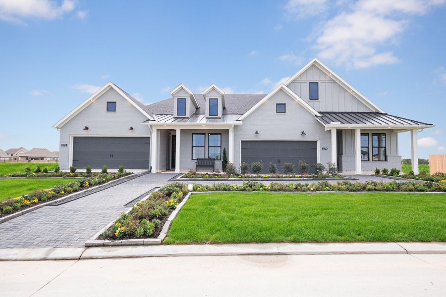 Front exterior of a home in the Bridgeland: Signature community, located in Cypress, TX (Image 2).