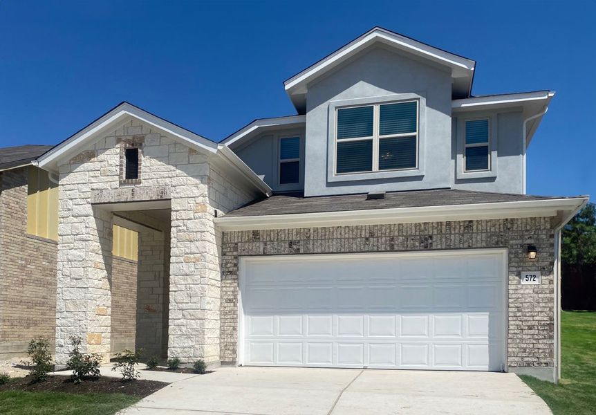 Front exterior of a home in the Crosswinds community, located in Kyle, TX (Image 5).