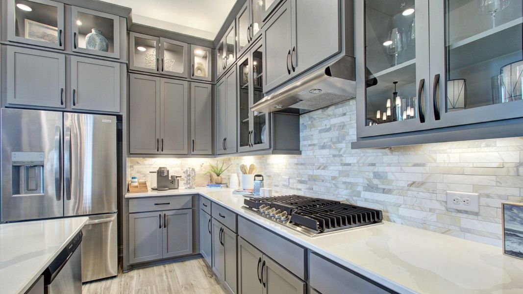 Furnished interior in a model home at The Crossvine in Schertz (Image 8).