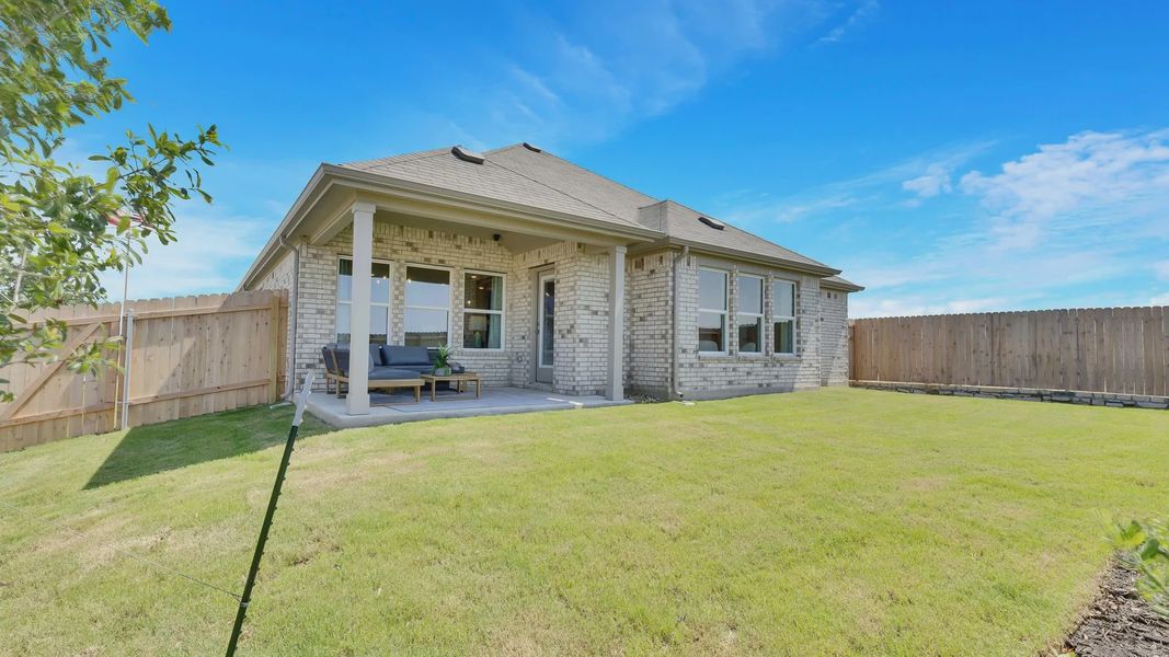 Luxurious brick facade and expansive patio enhance Hunts Glen's serene courtyard ambiance. Luxurious brick facade and expansive patio enhance Hunts Glen's serene courtyard ambiance.