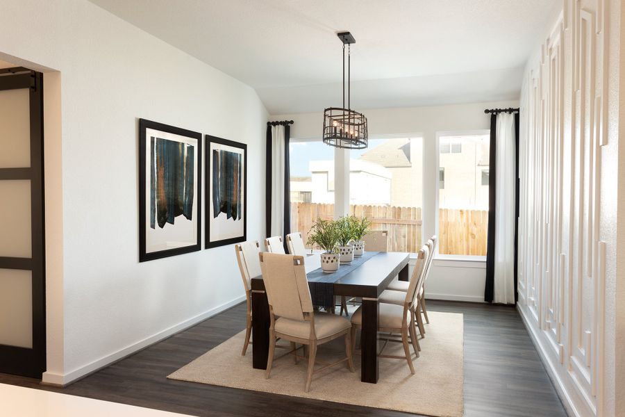 Furnished interior in a model home at East View Farms in Georgetown (Image 3).