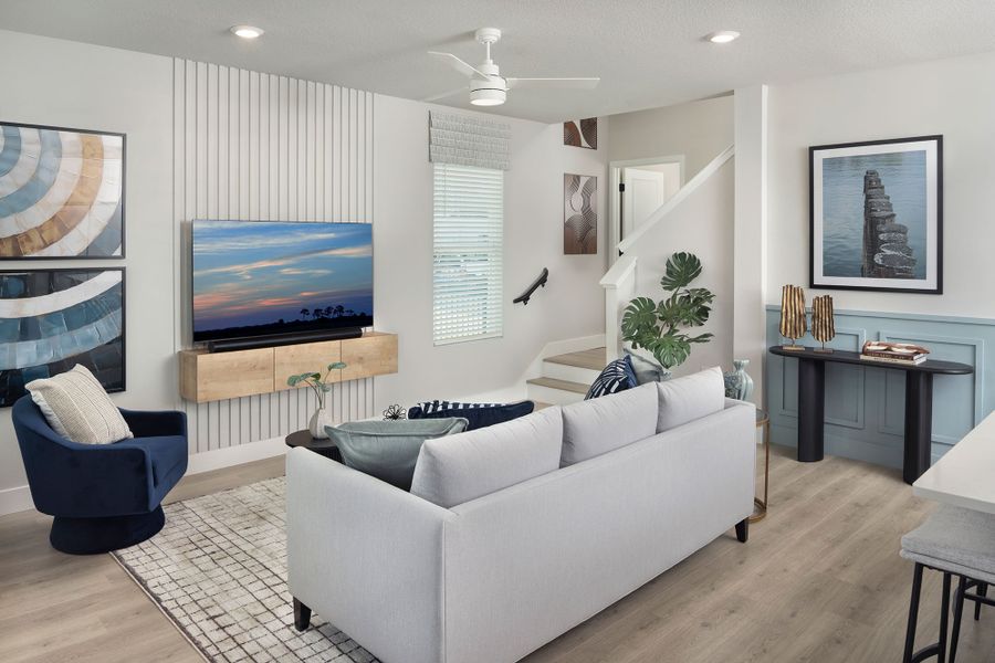 Furnished interior in a model home at Persimmon Place - Townhomes in Wesley Chapel (Image 17).