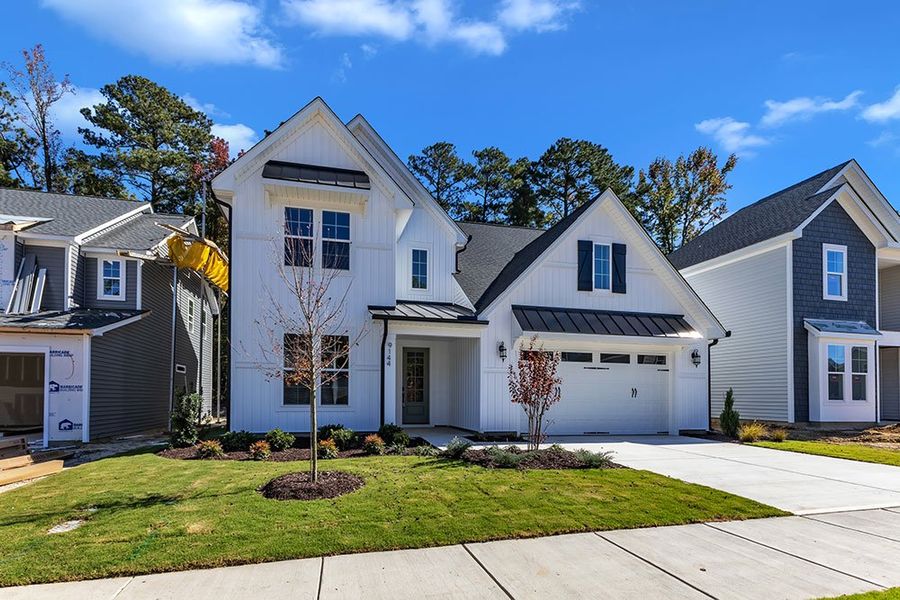Front exterior of a home in the WyndWater community, located in Hampstead, NC (Image 24).