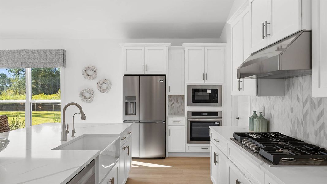 Furnished interior in a model home at Breakfast Point East Phase II in Panama City Beach (Image 5). Furnished interior in a model home at Breakfast Point East Phase II in Panama City Beach (Image 5).