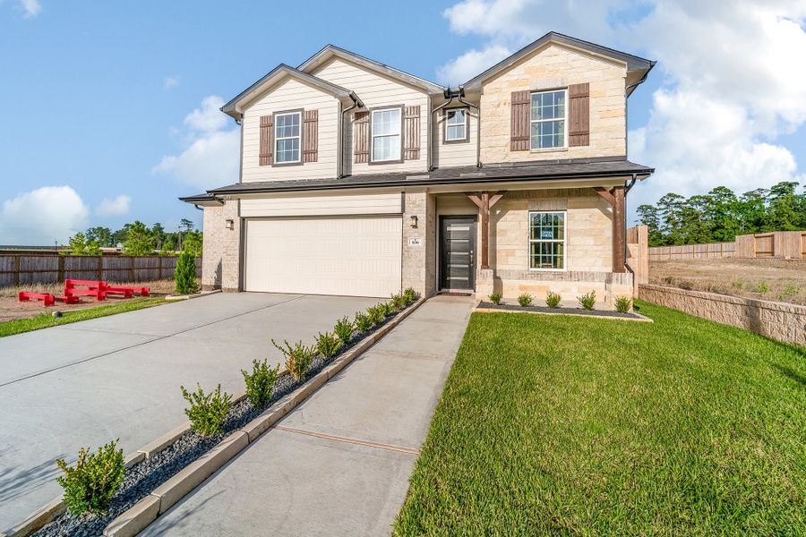 Front exterior of a home in the The Reserve at Huntsville community, located in Huntsville, TX (Image 8).
