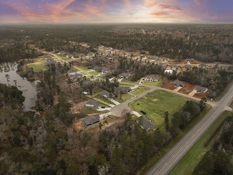 A landscape with houses and trees. A landscape with houses and trees.