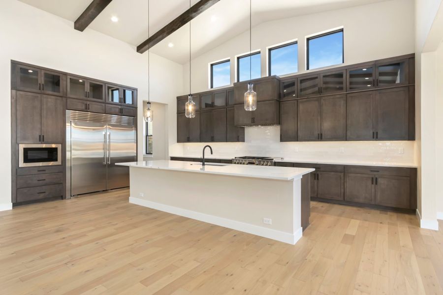Furnished interior in a model home at Acadia at RainDance in Windsor (Image 13).