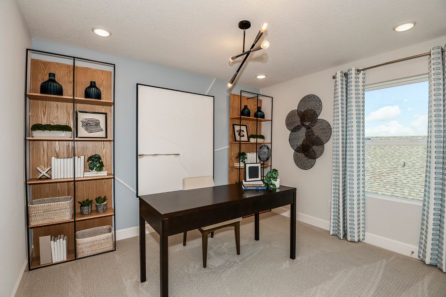 Furnished interior in a model home at Preservation Pointe in Davenport (Image 18).