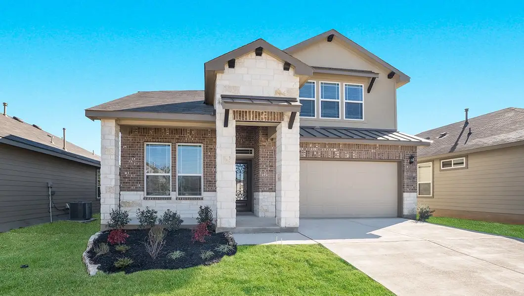 Front exterior of a home in the Veranda community, located in San Antonio, TX (Image 4).