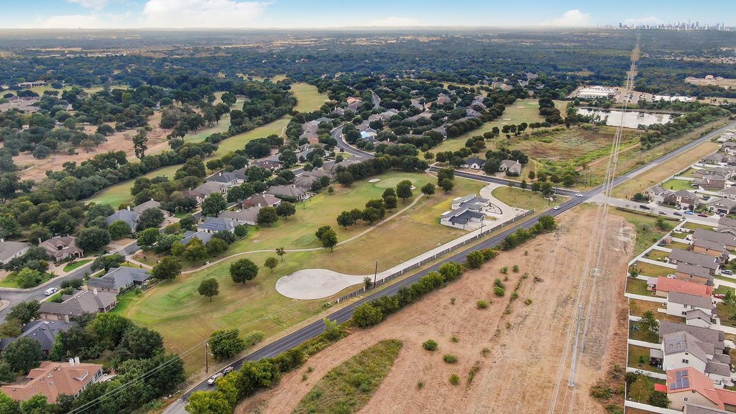 Aerial view of the Cloverleaf community in Austin, TX, showing layout and nearby surroundings (Image 13).