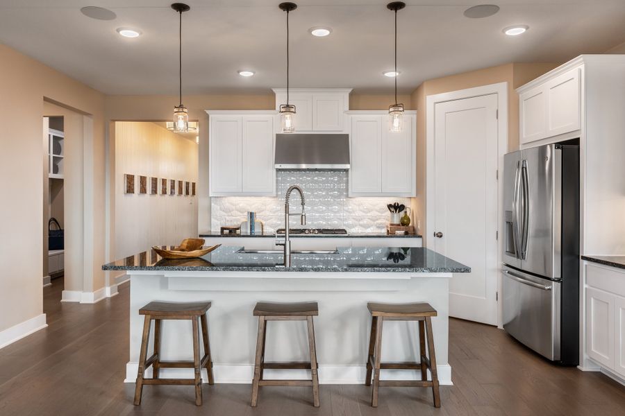Furnished interior in a model home at Travisso Capri in Leander (Image 7).