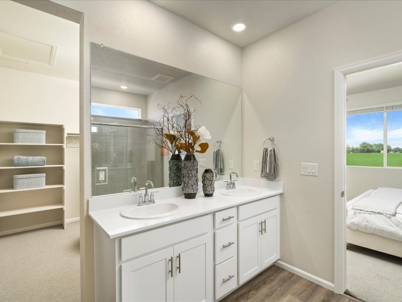 Furnished interior in a model home at Poudre Heights: The Alpine Collection in Windsor (Image 14).