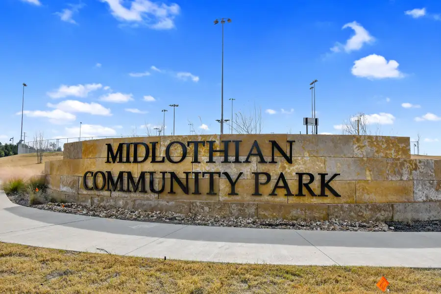 Entrance to the Massey Meadows community in Midlothian, TX, featuring signage and landscaping (Image 2).