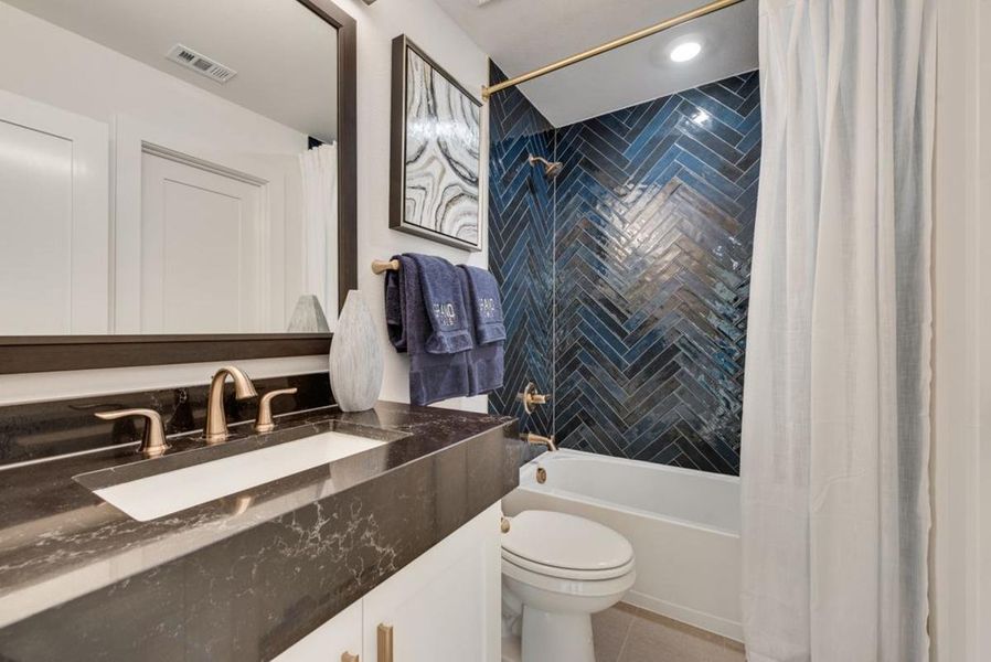 Furnished interior in a model home at Chatham Reserve in Providence Village (Image 18).