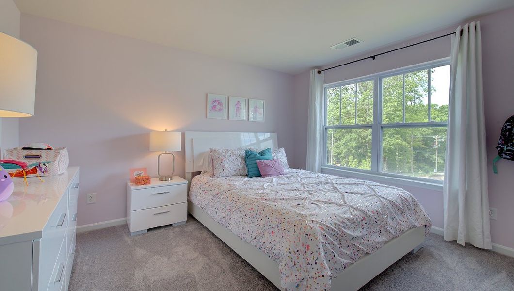 Furnished interior in a model home at Heritage Park in Fletcher (Image 28).