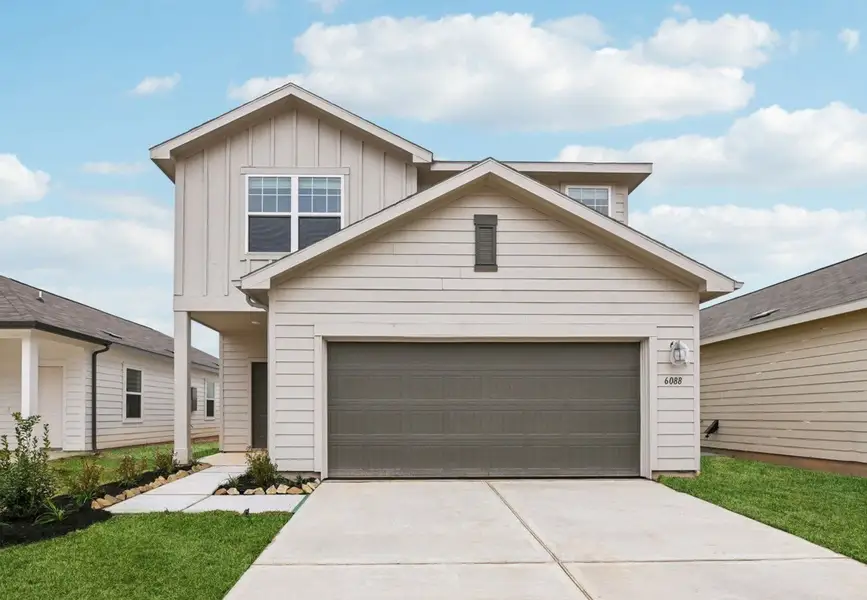 Front exterior of a home in the Eagles Landing community, located in Elgin, TX (Image 2).