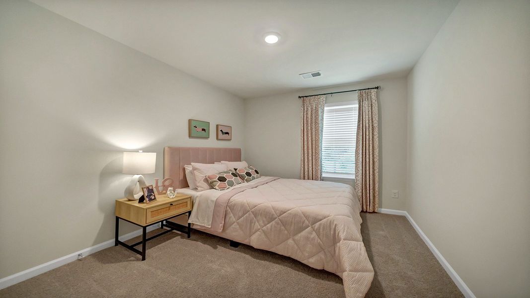 Furnished interior in a model home at Hunter's Branch Townhomes in Hopkins (Image 19).