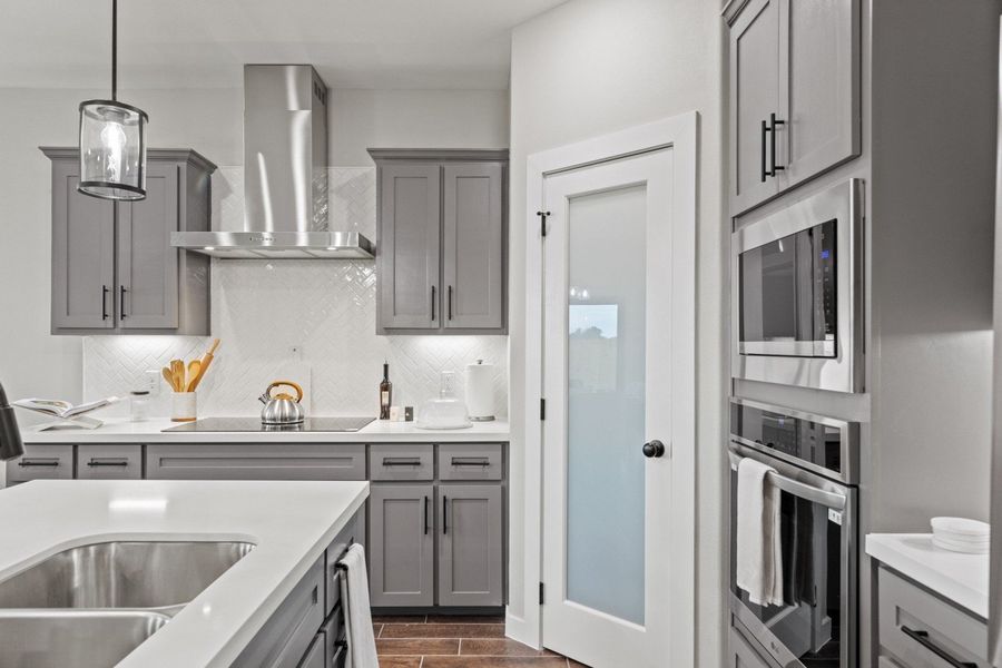 Furnished interior in a model home at The Heights at Riverbend II in Brownsville (Image 5).