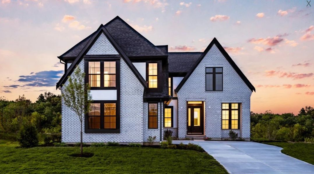 Front exterior of a home in the Watson at Flowers Plantation community, located in Clayton, NC (Image 11).