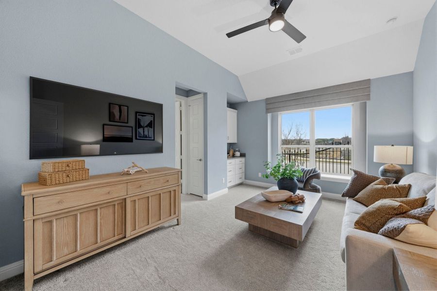 Furnished interior in a model home at Mustang Lakes in McKinney (Image 28).