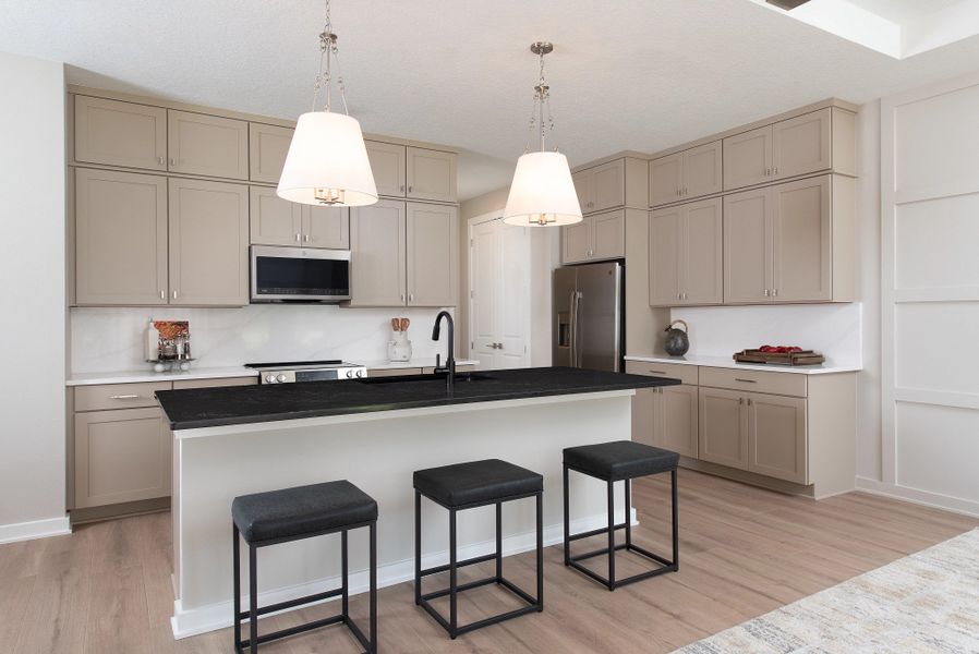 Furnished interior in a model home at Tyson Reserve in St. Cloud (Image 14).