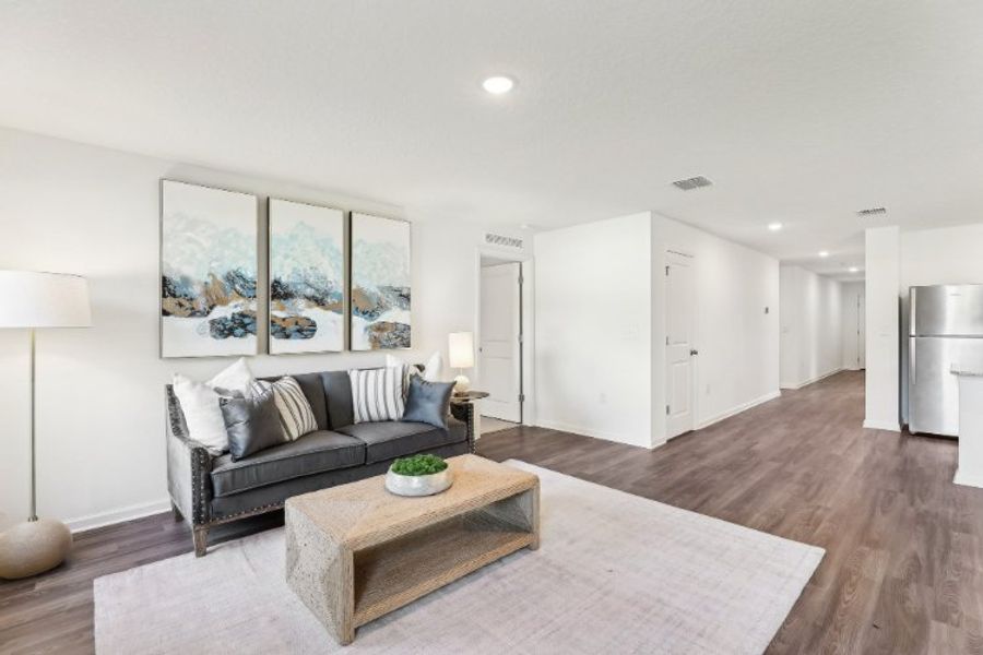 A living room with a couch and a coffee table.