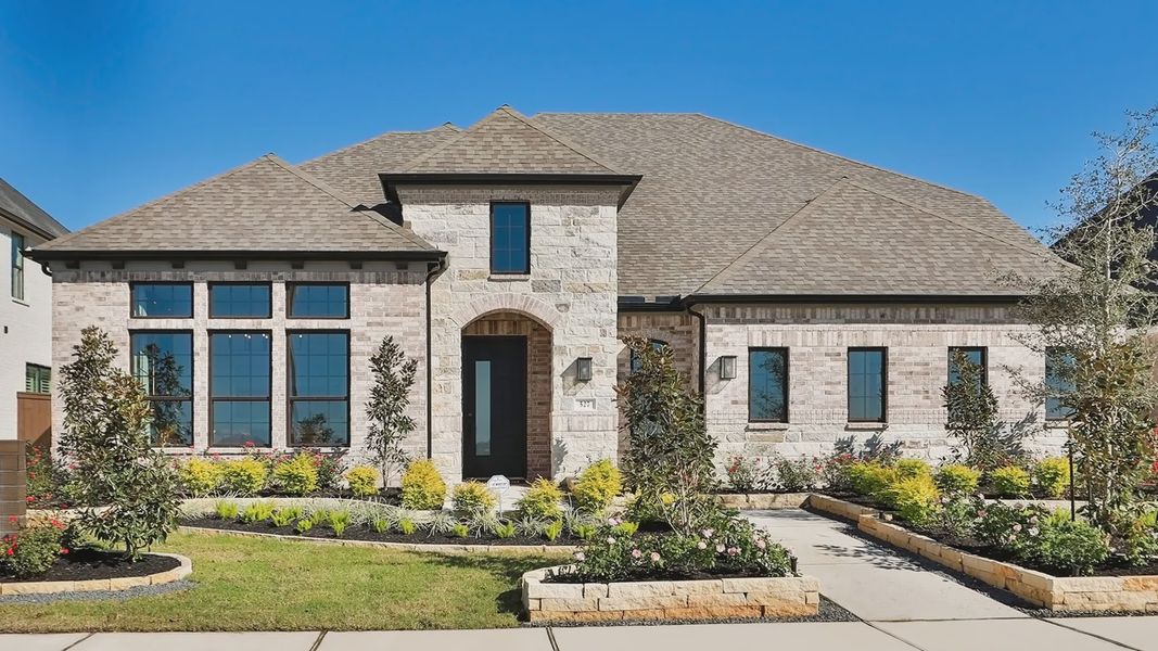 Admire the striking brick facade, expansive windows, and gabled roof in the serene Brookewater community. Admire the striking brick facade, expansive windows, and gabled roof in the serene Brookewater community.