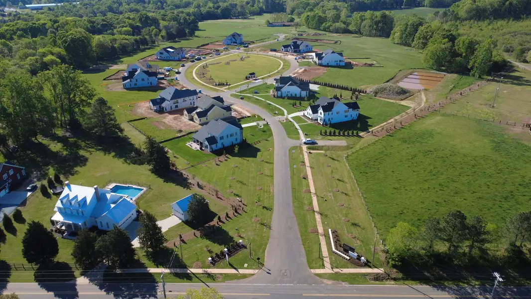 Aerial view of the Stephens Farm community in Huntersville, NC, showing layout and nearby surroundings (Image 6). Aerial view of the Stephens Farm community in Huntersville, NC, showing layout and nearby surroundings (Image 6).
