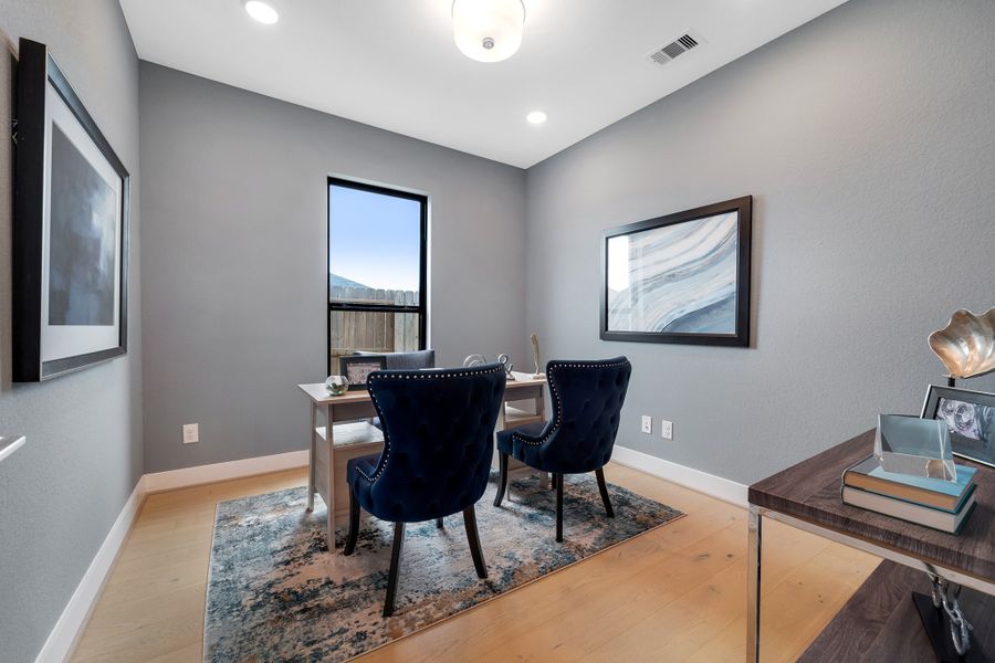 Furnished interior in a model home at Mulberry Farms in Santa Fe (Image 6).