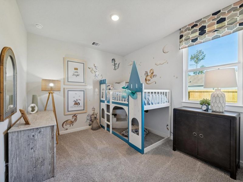 Furnished interior in a model home at Spring Branch Crossing in Conroe (Image 28).