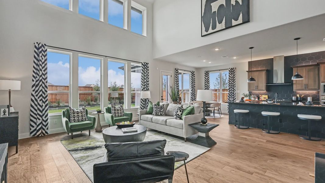 Soaring ceilings and expansive windows amplify light and space, accentuated by chic decor in Green Meadows. Soaring ceilings and expansive windows amplify light and space, accentuated by chic decor in Green Meadows.
