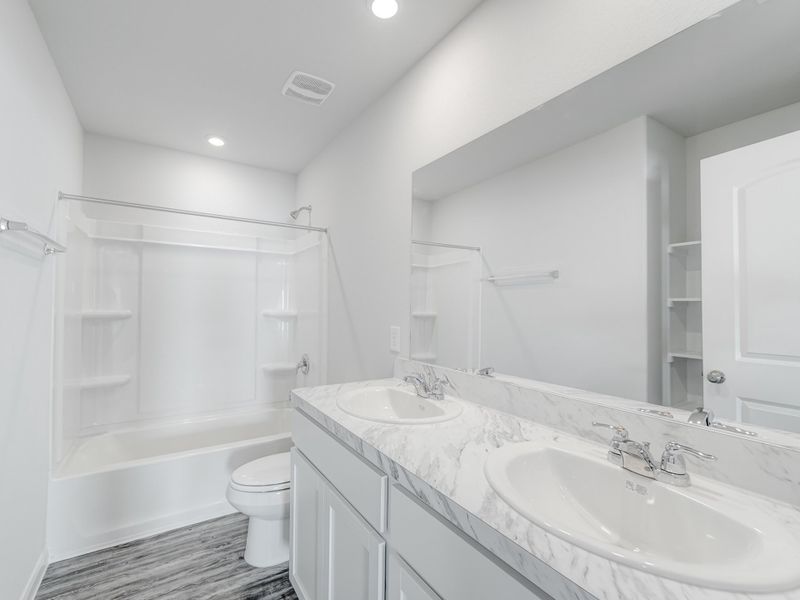 Furnished interior in a model home at Splawn Ranch in Killeen (Image 19).