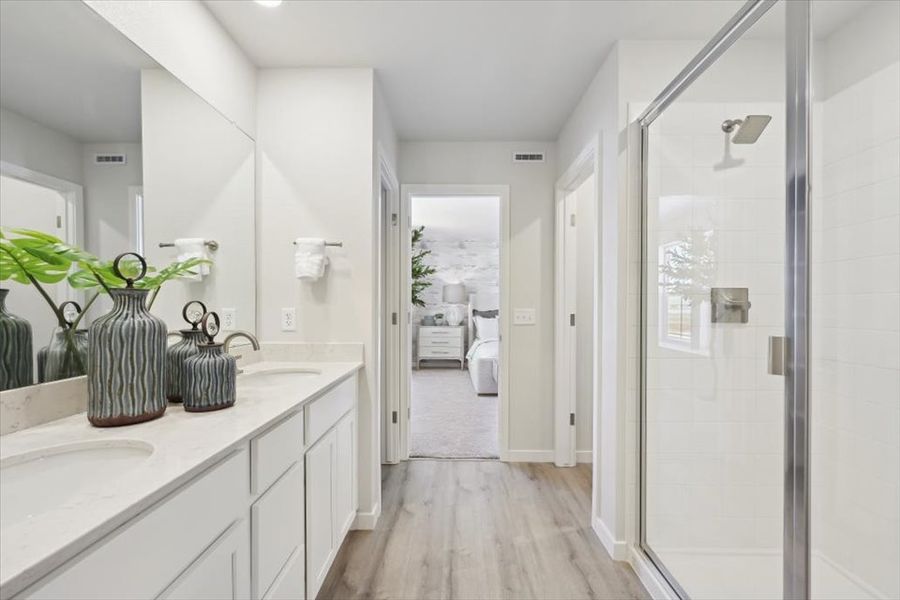 A bathroom with a glass shower.