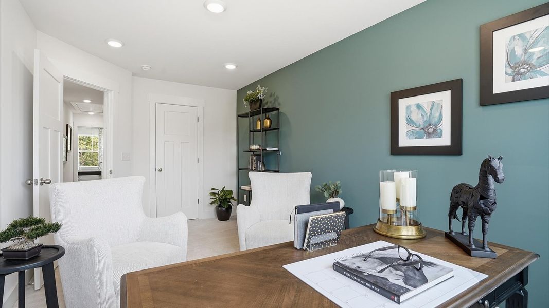 Highly functional bedroom with large windows, carpeted flooring, and tasteful finishes throughout Highly functional bedroom with large windows, carpeted flooring, and tasteful finishes throughout