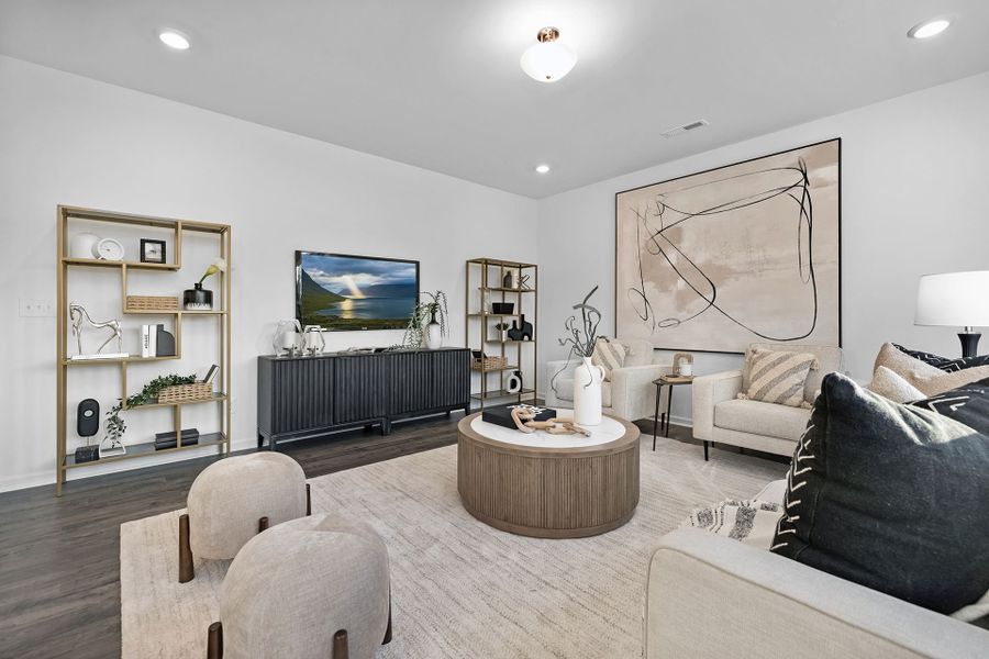 Furnished interior in a model home at Whispering Hills in Locust (Image 4).