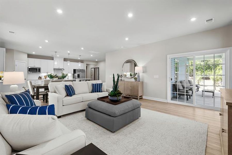 Enjoy seamless indoor-outdoor living in this inviting space made for comfort and gathering.