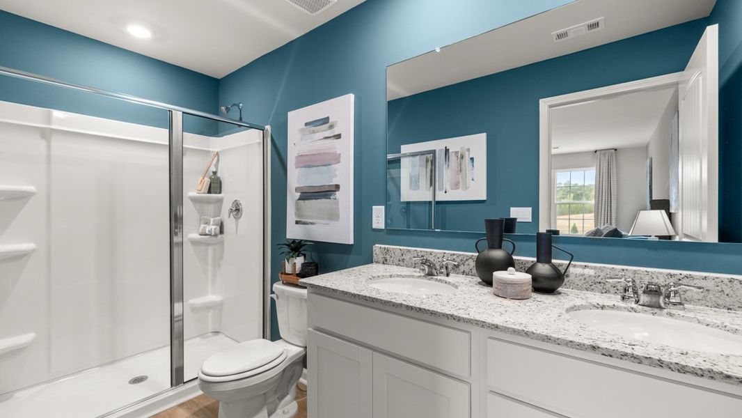 Furnished interior in a model home at Woodbury Park in Atlanta (Image 34).