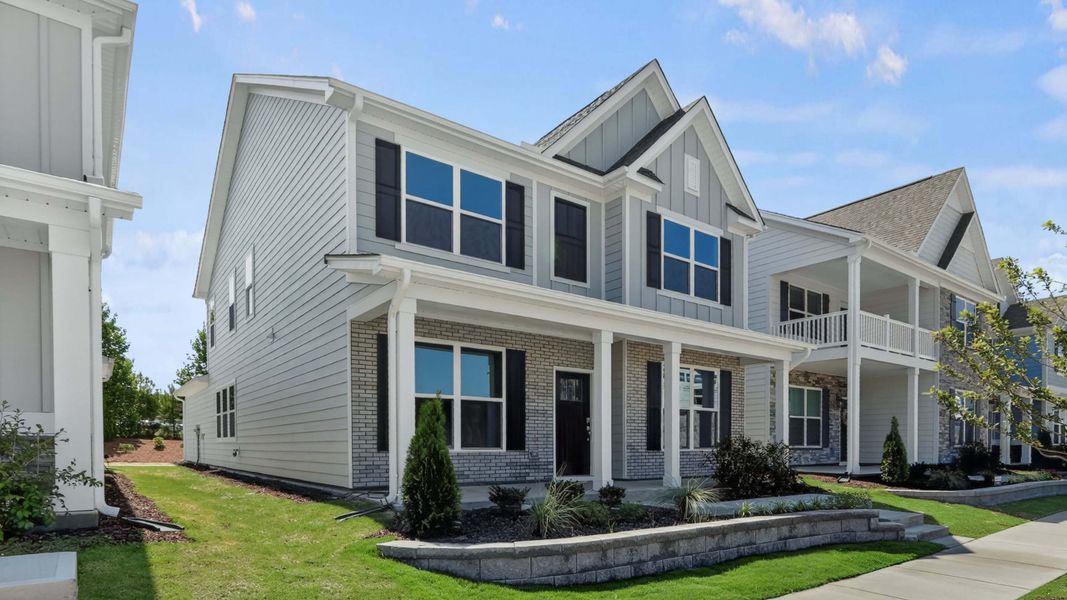 Front exterior of a home in the Madden West community, located in Fuquay Varina, NC (Image 5). Front exterior of a home in the Madden West community, located in Fuquay Varina, NC (Image 5).
