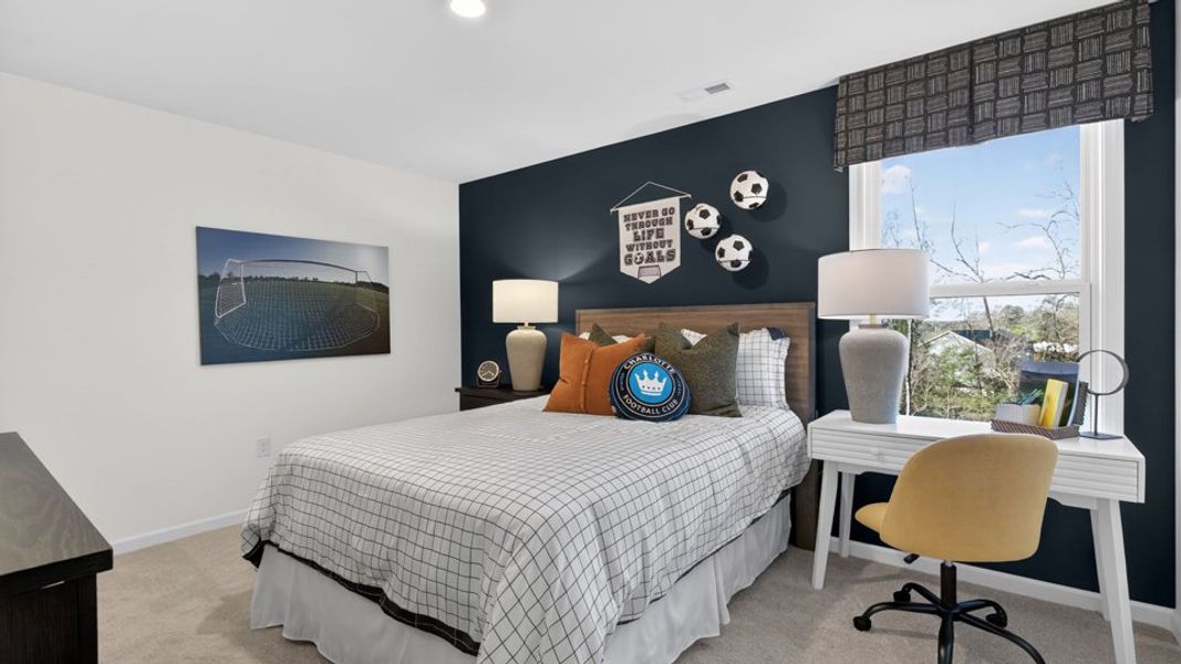 Furnished interior in a model home at The Grove at Winston Pointe in Clayton (Image 32).