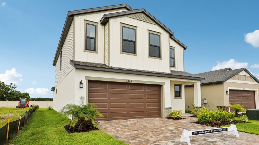 The Naples Quick Move-In Home by DRB Homes at Grasslands West in Lakeland, FL