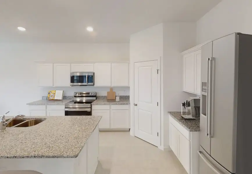 Furnished interior in a model home at Sunset Hills in Winter Haven (Image 4).