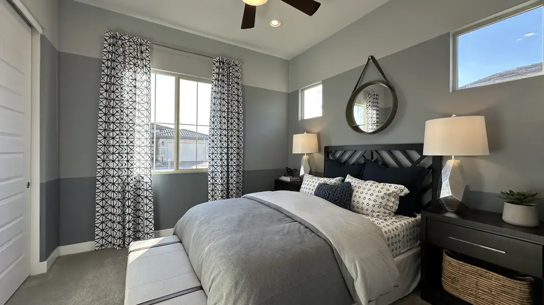 Furnished interior in a model home at CantaMia at Estrella 55+ in Goodyear (Image 37).