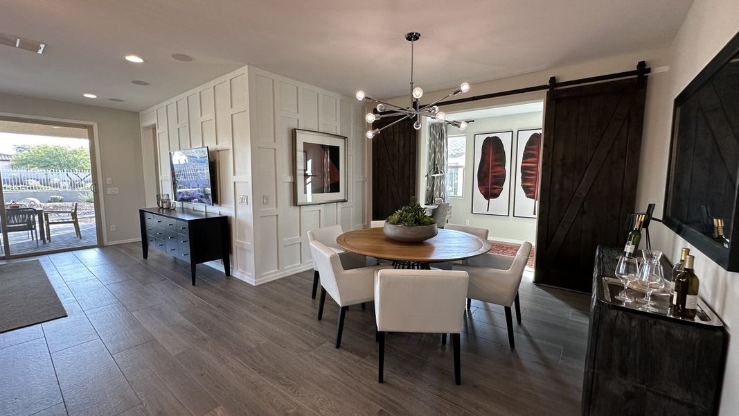 Furnished interior in a model home at CantaMia at Estrella 55+ in Goodyear (Image 32).