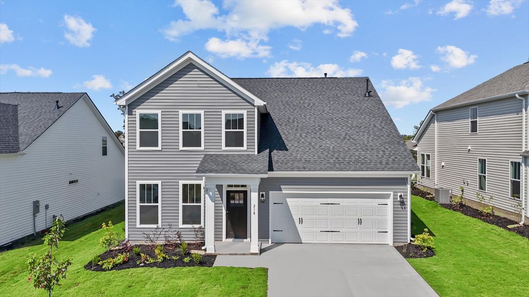 Front exterior of a home in the The Wilds at Cedar Mountain community, located in Asheville, NC (Image 12).