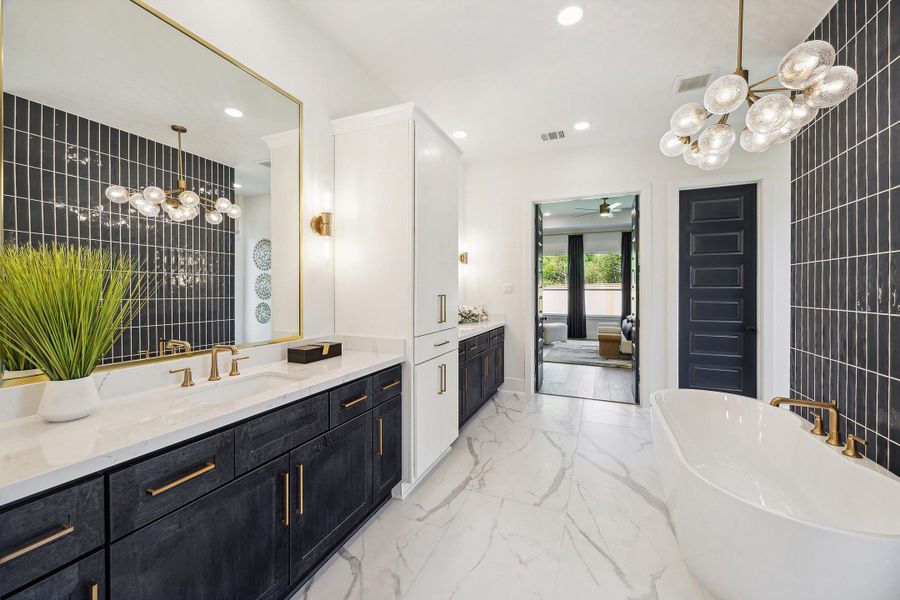 Furnished interior in a model home at Audubon - 70' in Magnolia (Image 16).