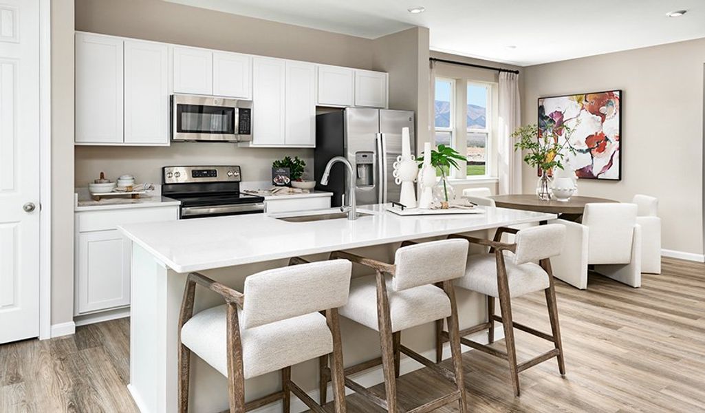 Furnished interior in a model home at The Duos at Parkdale in Erie (Image 3).