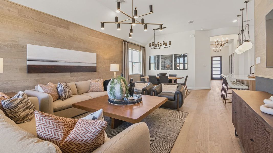 Experience sophistication with wood paneling, designer lighting, and an airy open plan in River Ranch.